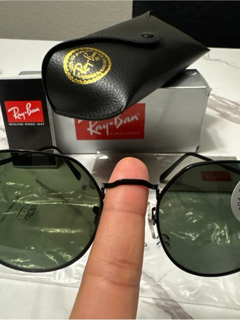 Ray-Ban Black Frame Sunglasses with Green Polarized Lenses